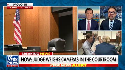 Smiling Kirk murder suspect fuels cameras in courtroom debate