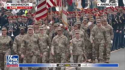 'Army Goes Rolling Along' as Trump salutes troops at military parade