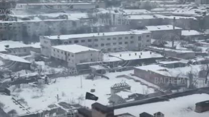 Winter, snow-covered Bakhmut. It Snowed for the first time in a while. Black Flag of the "Musicians" on Occupied Positions.