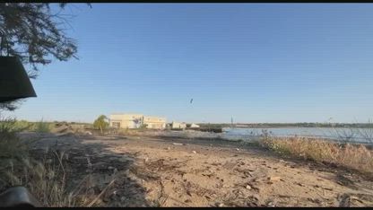 Erosion of minefields caused by the destruction of the dam causing mines to float downstream and blowing up on contact
