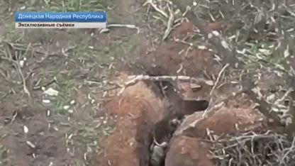 Hard shots of trench battle. Ukrainian soldiers are trying to take the trench with Russian fighters, crushing them with fire and bombing from a copter